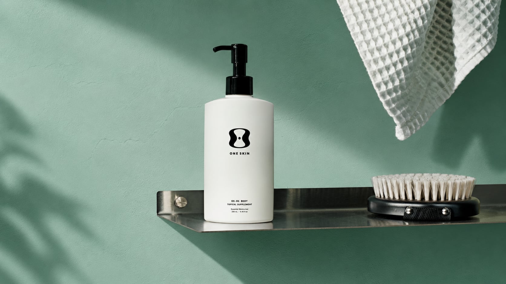OS-01 Body Moisturizer on a bathroom shelf